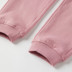 Pink Kids Joggers from Polarn O. Pyret kidswear. Clothes made using sustainably sourced materials.