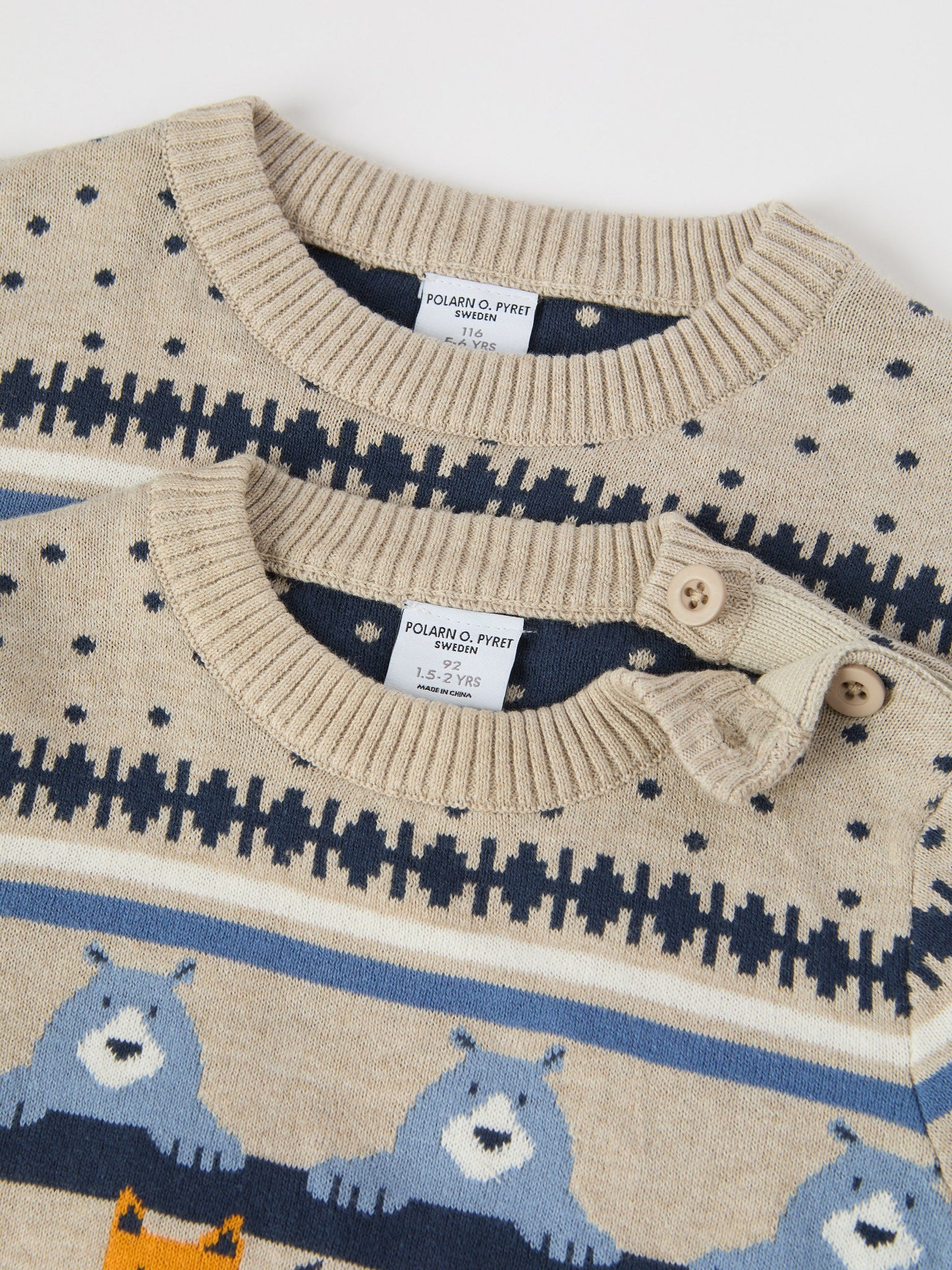 Beige Nordic Animal Kids Jumper from the Polarn O. Pyret kidswear collection. Nordic kids clothes made from sustainable sources.