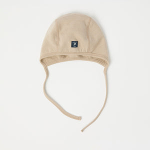 Beige Merino Wool Baby Helmet Hat from the Polarn O. Pyret kidswear collection. Quality kids clothing made to last.