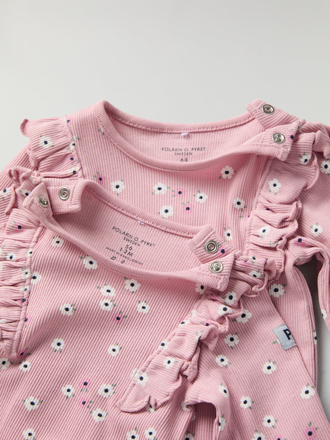 Floral Frilled Babygrow from the Polarn O. Pyret baby collection. Clothes made using sustainably sourced materials.