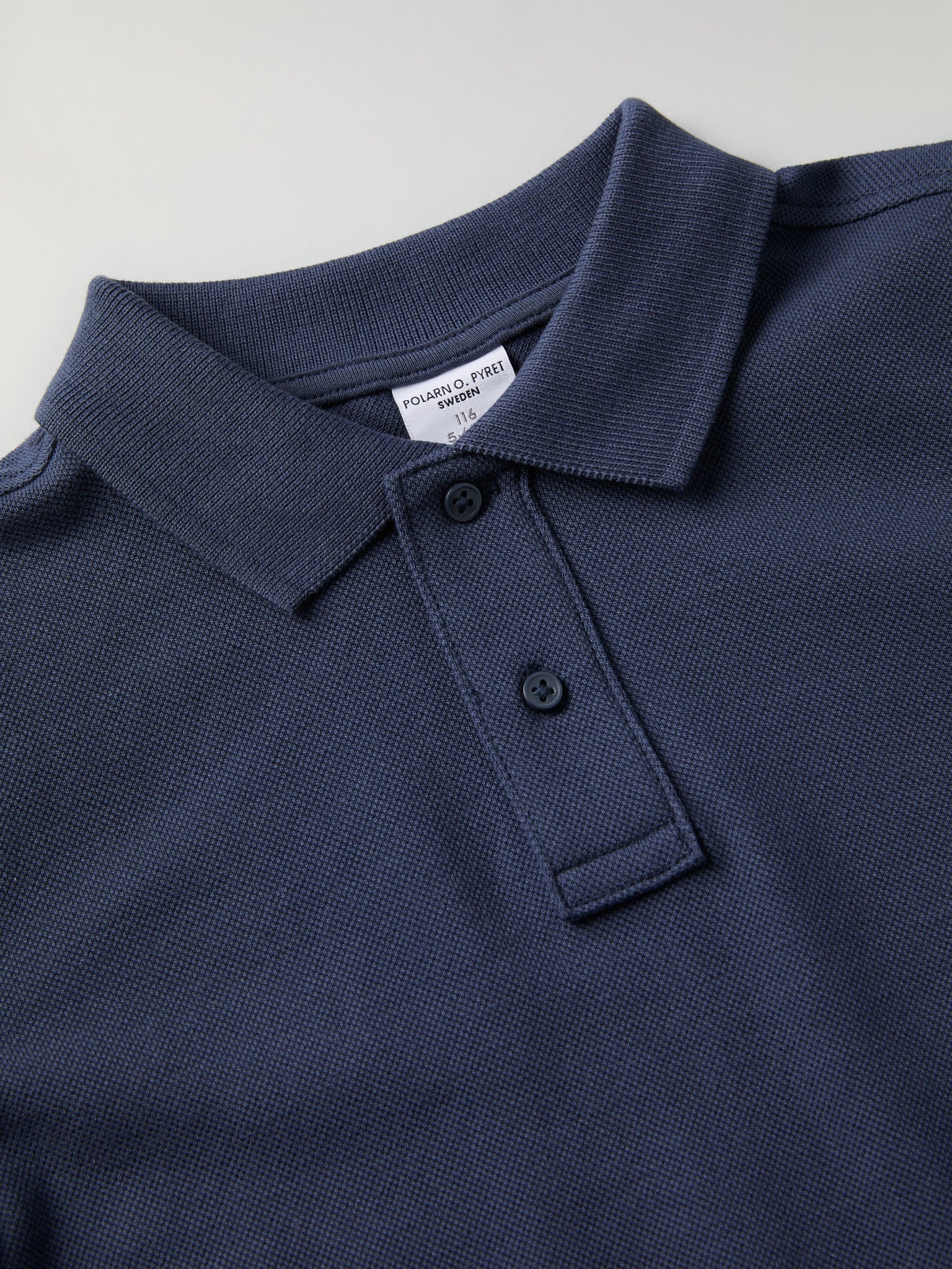 Blue Long Sleeve Polo Top from Polarn O. Pyret kidswear. Ethically produced kids clothing.