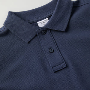 Blue Long Sleeve Polo Top from Polarn O. Pyret kidswear. Ethically produced kids clothing.