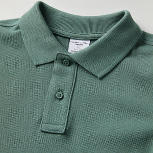 Green Long Sleeve Polo Top from Polarn O. Pyret kidswear. Clothes made using sustainably sourced materials.