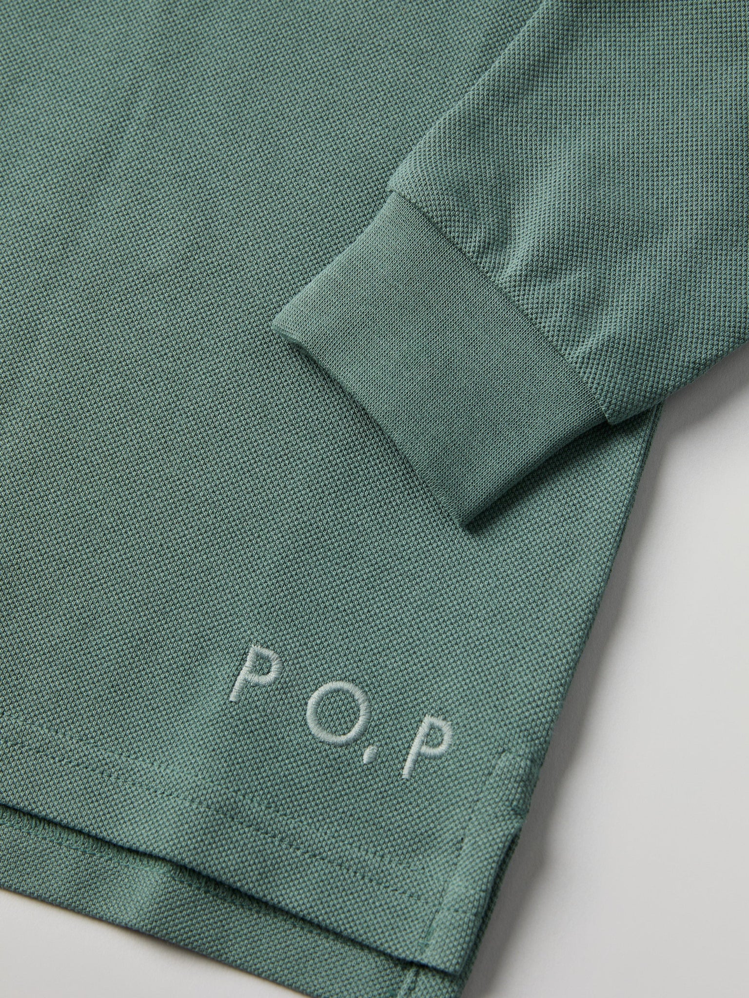 Green Long Sleeve Polo Top from Polarn O. Pyret kidswear. Clothes made using sustainably sourced materials.