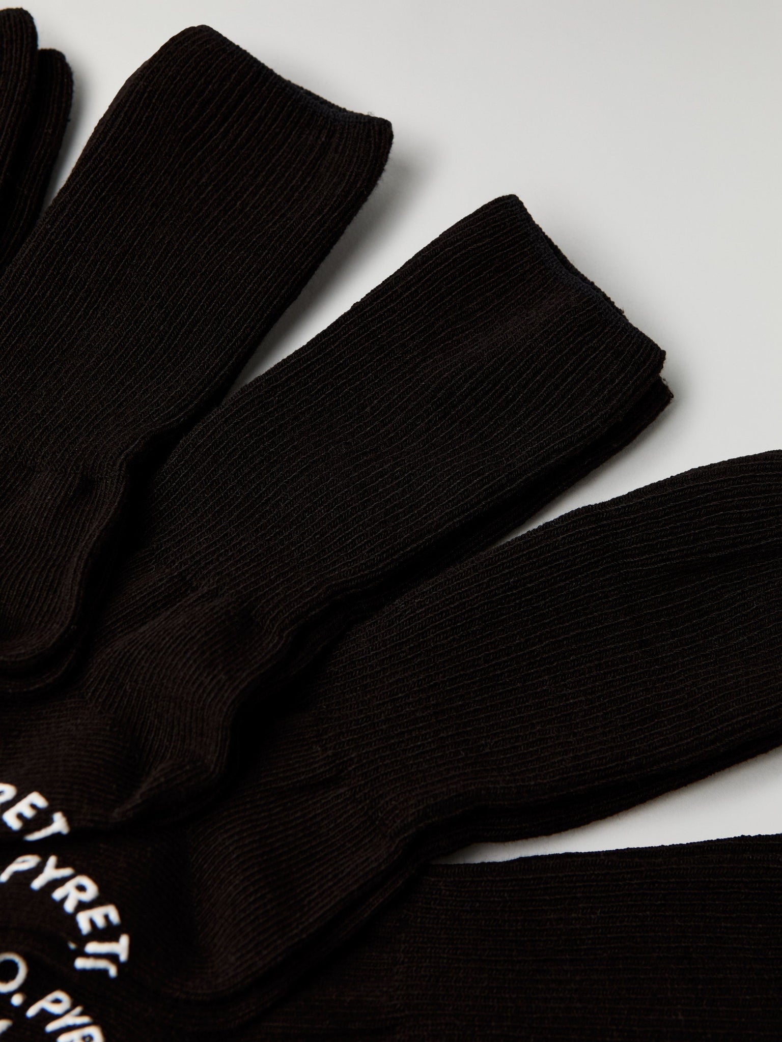 Five Pack Black Kids Socks from Polarn O. Pyret kidswear. Nordic kids clothes made from sustainable sources.