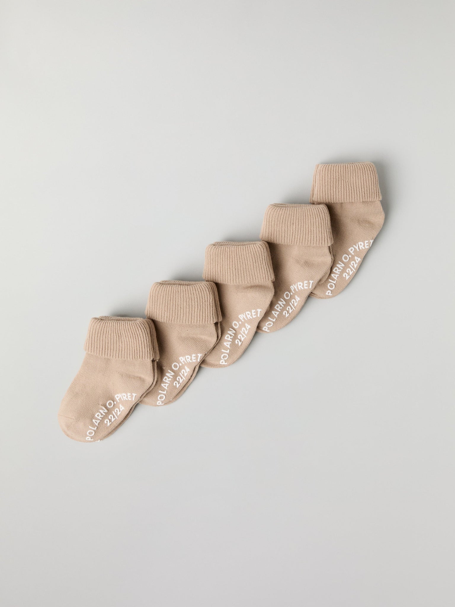 Five Pack Beige Kids Socks from Polarn O. Pyret kidswear. Clothes made using sustainably sourced materials.