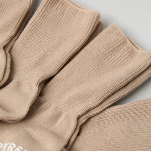 Five Pack Beige Kids Socks from Polarn O. Pyret kidswear. Clothes made using sustainably sourced materials.