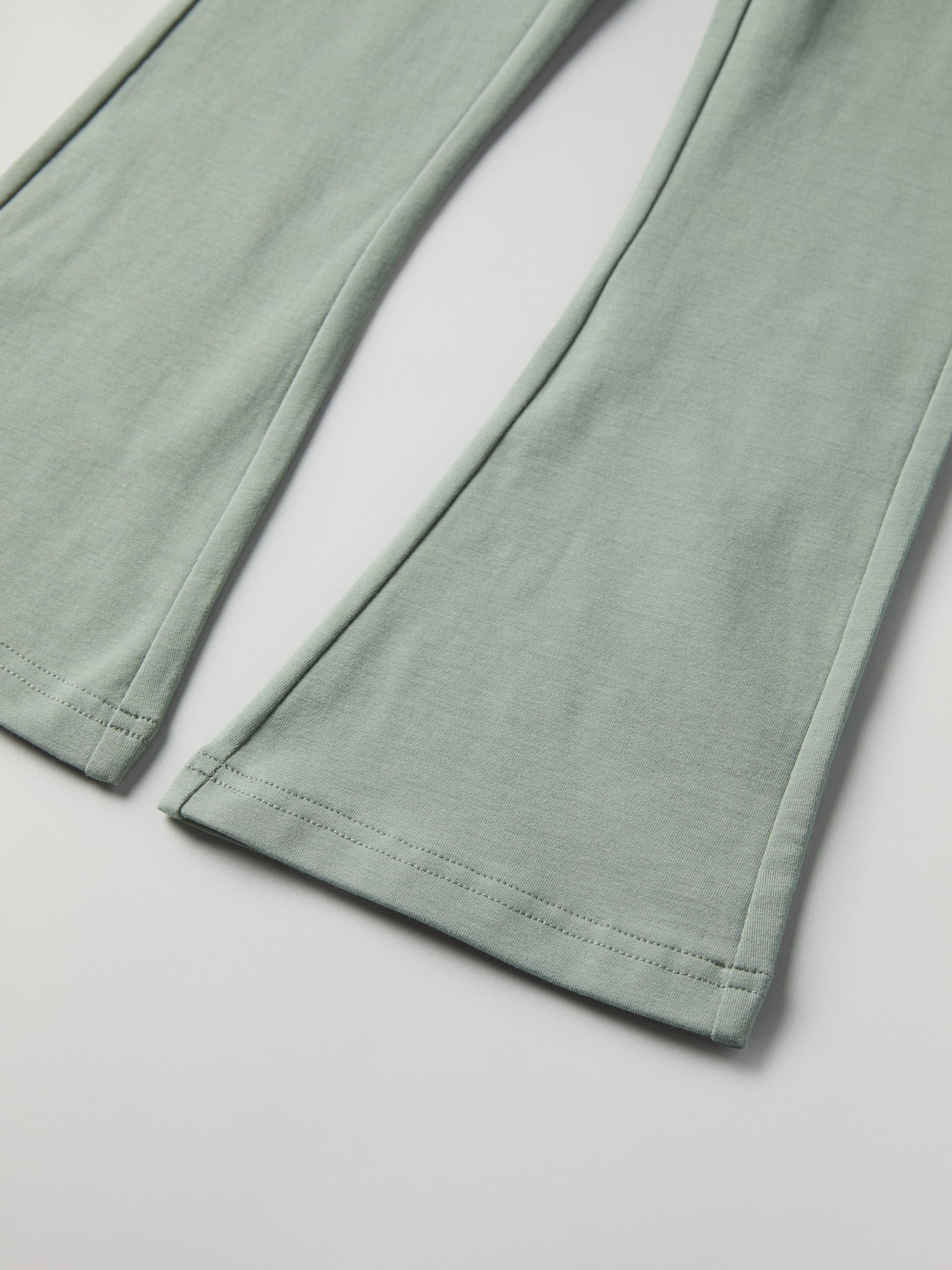 Green Kids Flared Joggers from Polarn O. Pyret kidswear. Nordic kids clothes made from sustainable sources.