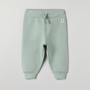 Soft Green Baby Joggers from the Polarn O. Pyret baby collection. Nordic kids clothes made from sustainable sources.