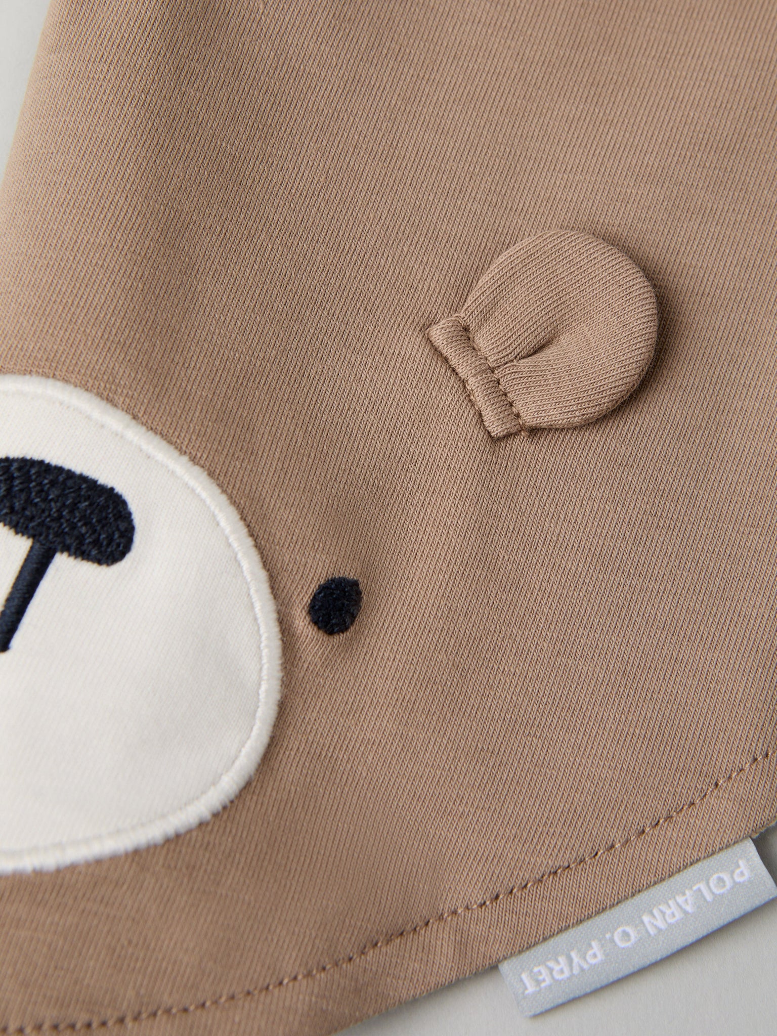 Organic Cotton Bear Applique Baby Bib from the Polarn O. Pyret baby collection. Ethically produced kids clothing.