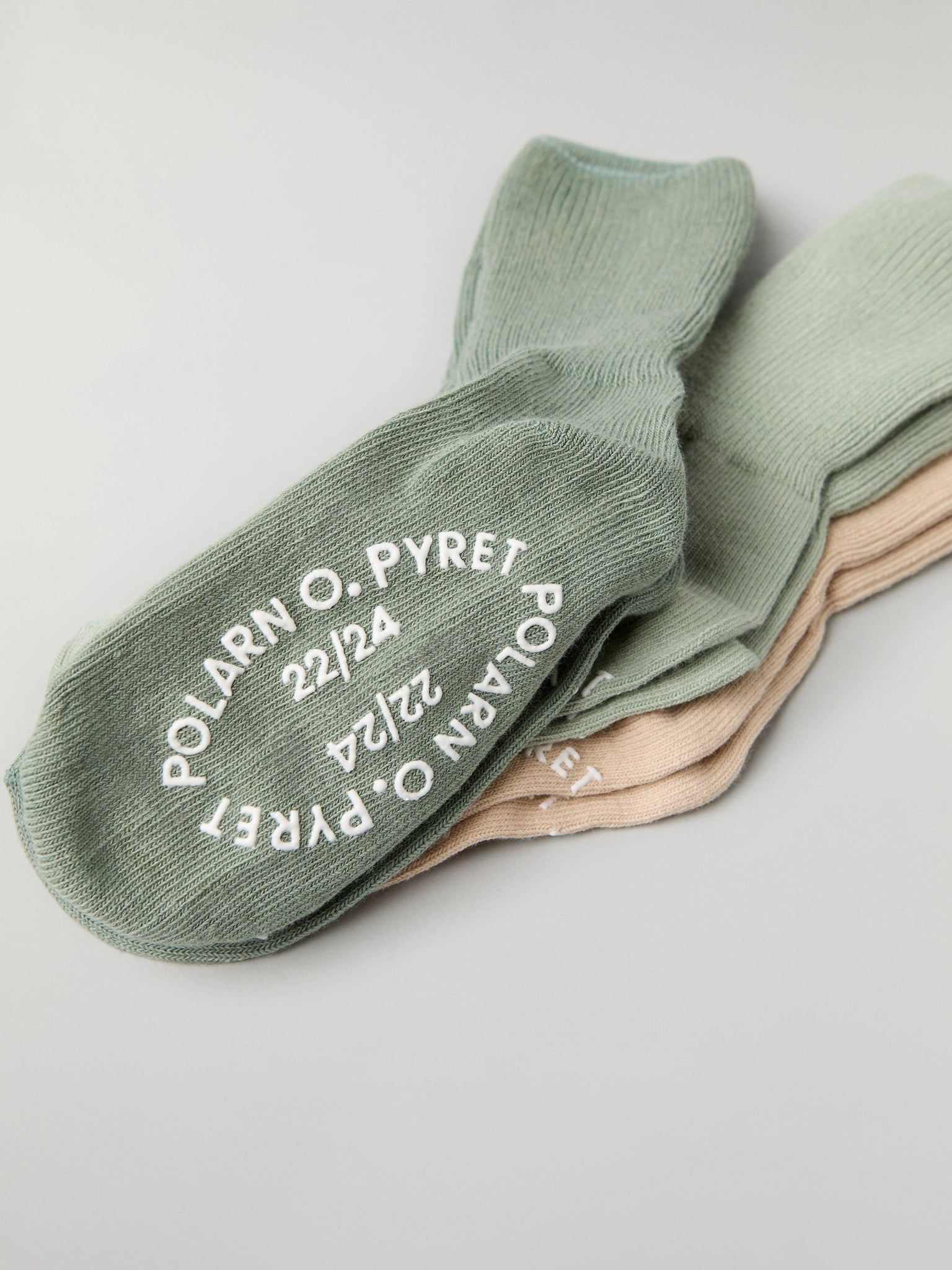 Three Pack Antislip Kids Socks from Polarn O. Pyret kidswear. Clothes made using sustainably sourced materials.