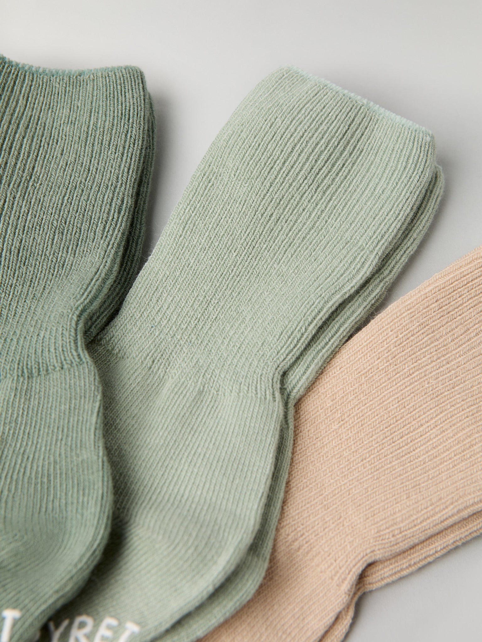 Three Pack Antislip Kids Socks from Polarn O. Pyret kidswear. Clothes made using sustainably sourced materials.