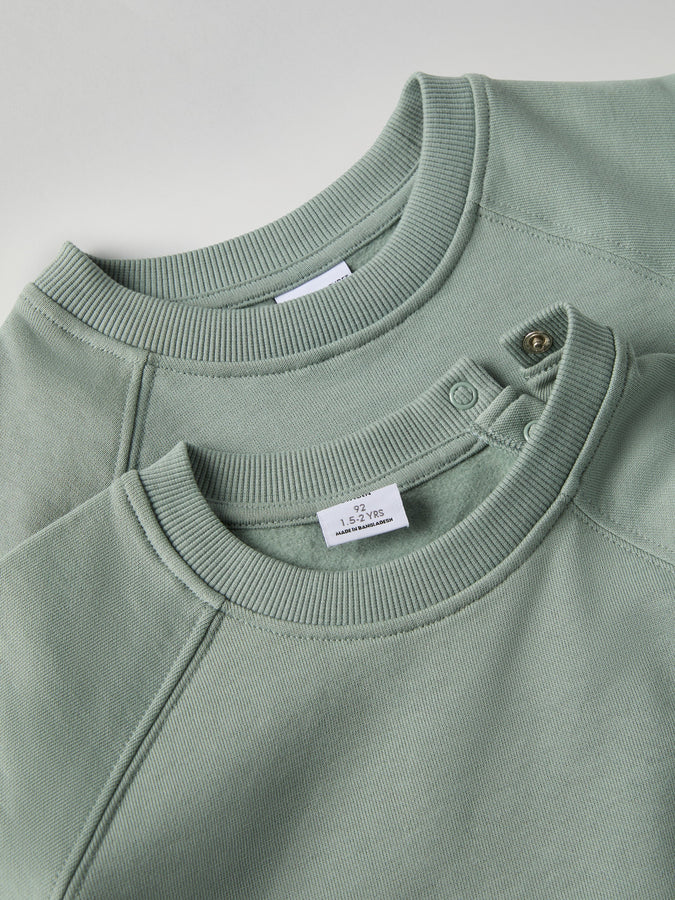 Green Kids Sweatshirt from Polarn O. Pyret kidswear. Clothes made using sustainably sourced materials.