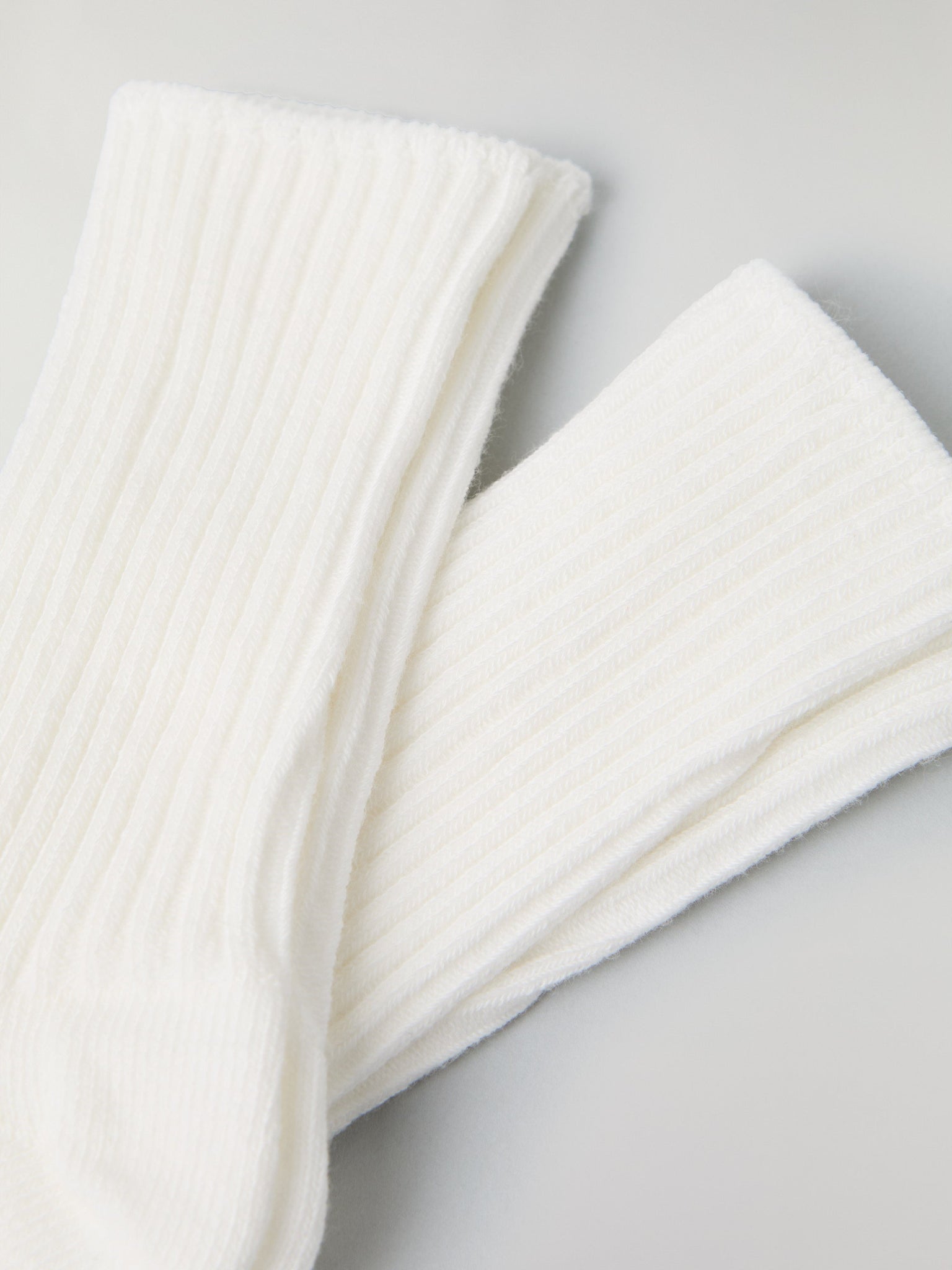 White Two Pack Baby Socks from the Polarn O. Pyret baby collection. Nordic kids clothes made from sustainable sources.