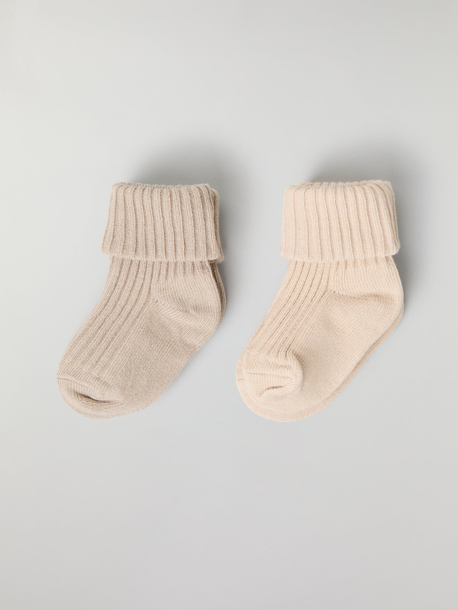 Beige Two Pack Baby Socks from the Polarn O. Pyret baby collection. Ethically produced kids clothing.