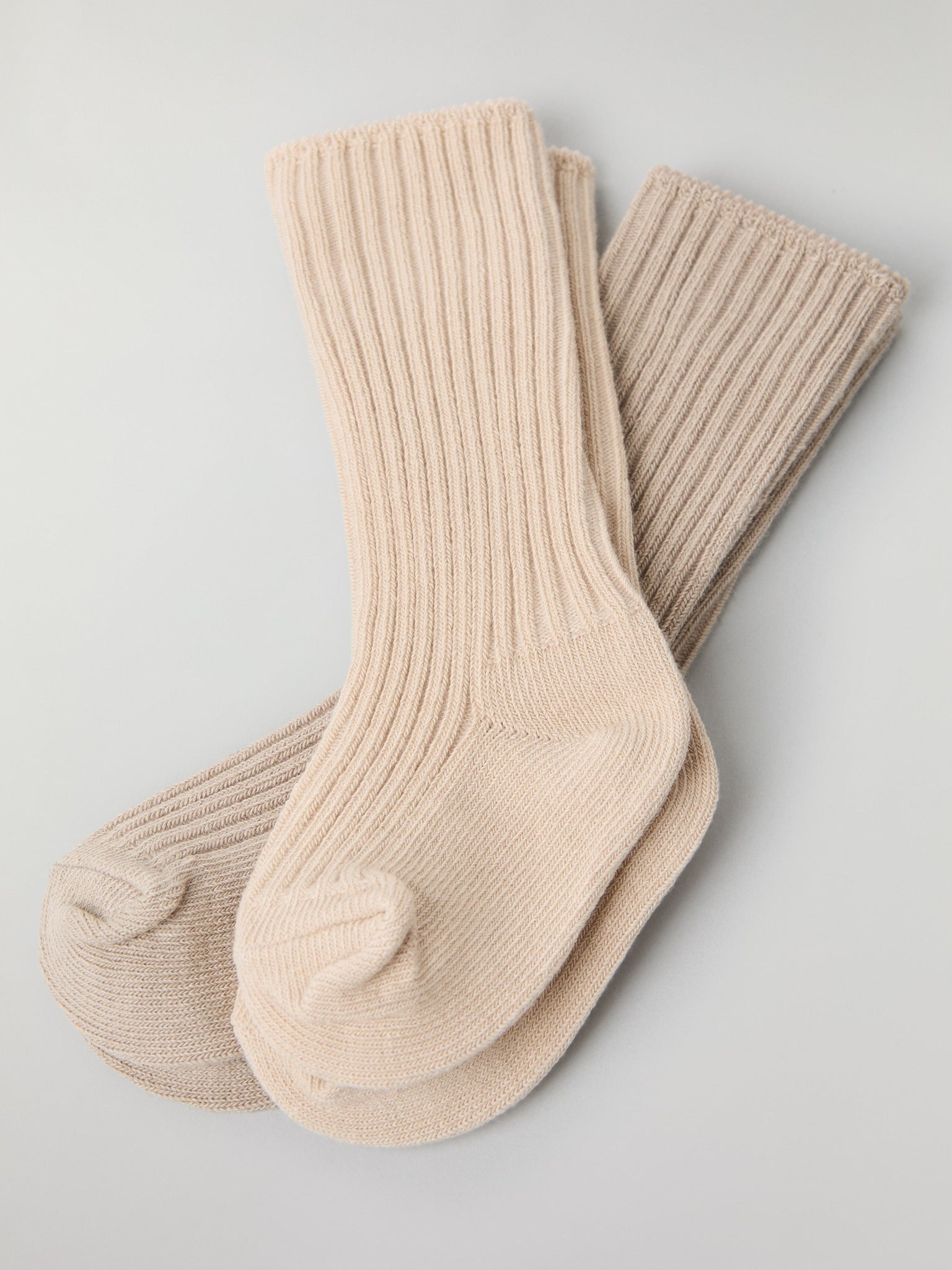 Beige Two Pack Baby Socks from the Polarn O. Pyret baby collection. Ethically produced kids clothing.