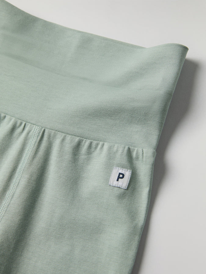 Green Soft Baby Leggings from the Polarn O. Pyret baby collection. Clothes made using sustainably sourced materials.