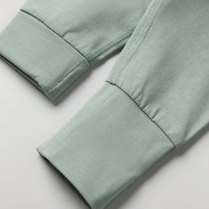 Green Soft Baby Leggings from the Polarn O. Pyret baby collection. Clothes made using sustainably sourced materials.