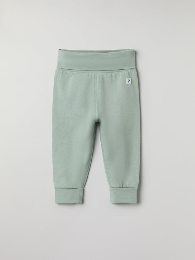 Green Soft Baby Leggings from the Polarn O. Pyret baby collection. Clothes made using sustainably sourced materials.