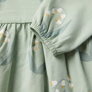 Lily Print Baby Dress from the Polarn O. Pyret baby collection. Clothes made using sustainably sourced materials.