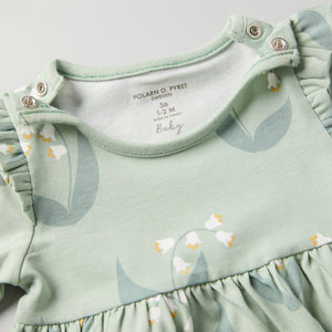 Lily Print Baby Dress from the Polarn O. Pyret baby collection. Clothes made using sustainably sourced materials.