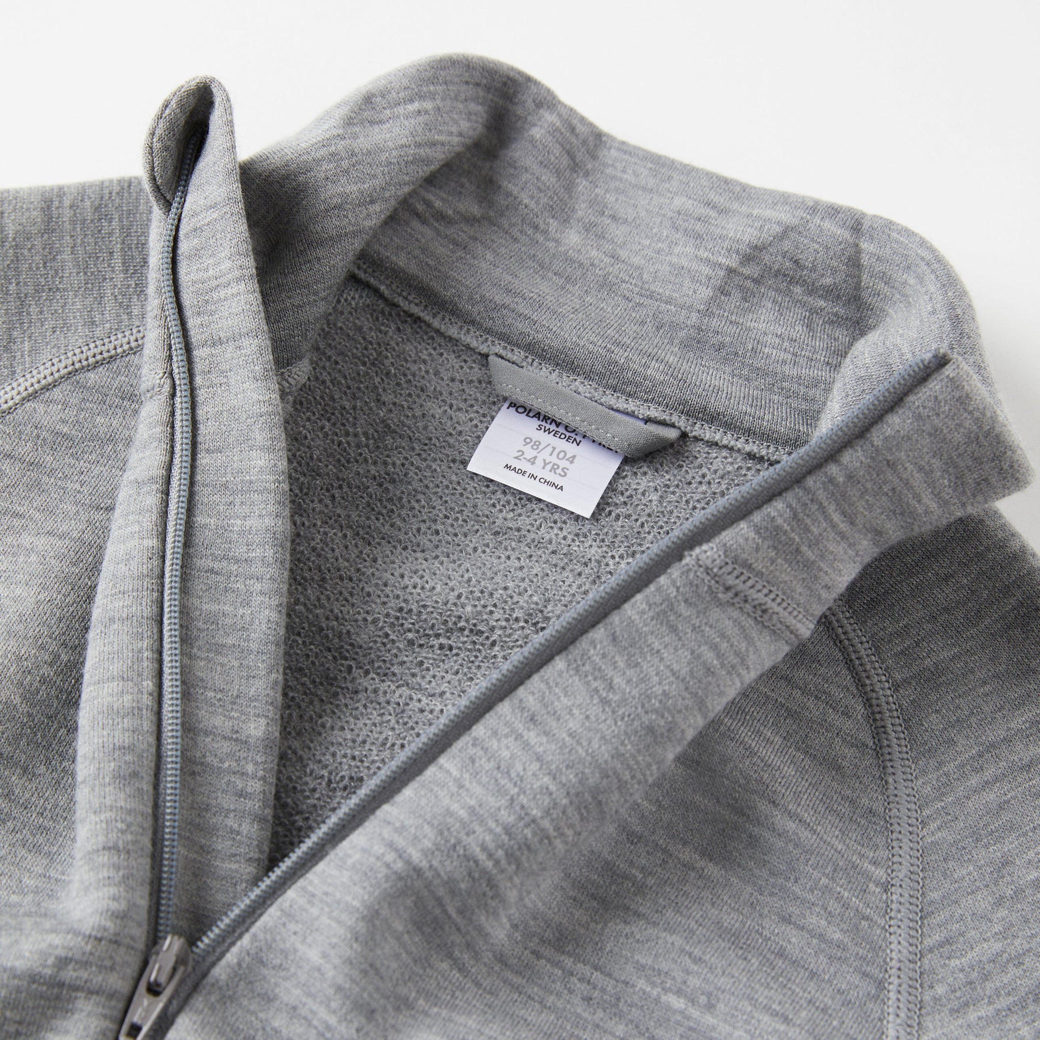 Terry Wool Grey Kids Thermal Zip Top from the Polarn O. Pyret outerwear collection. Ethically produced kids outerwear.