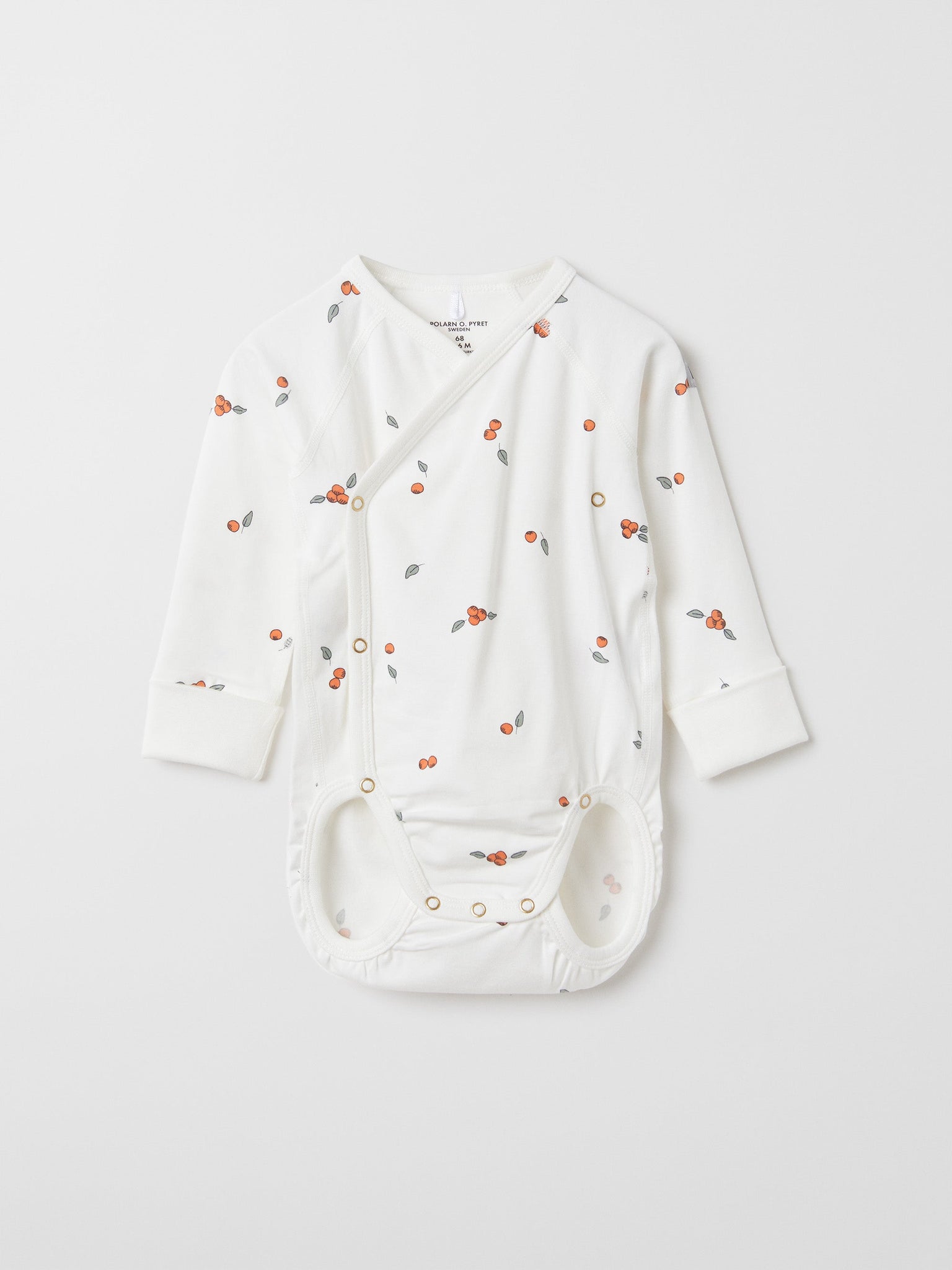 Organic Cotton White Wraparound Babygrow from the Polarn O. Pyret baby collection. Clothes made using sustainably sourced materials.