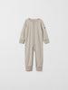 Organic Cotton Beige Baby Sleepsuit from the Polarn O. Pyret baby collection. Made using 100% GOTS Organic Cotton