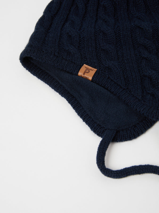 Wool Kids Navy Bobble Hat from the Polarn O. Pyret outerwear collection. Made using ethically sourced materials.